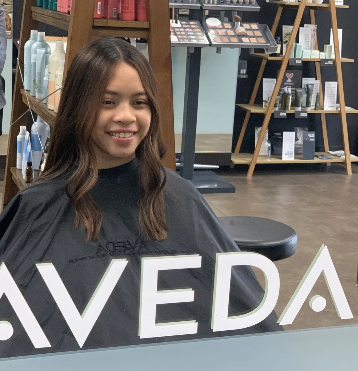 Mid-length brunette layered cut at DC Hair Lounge Baulkham Hills