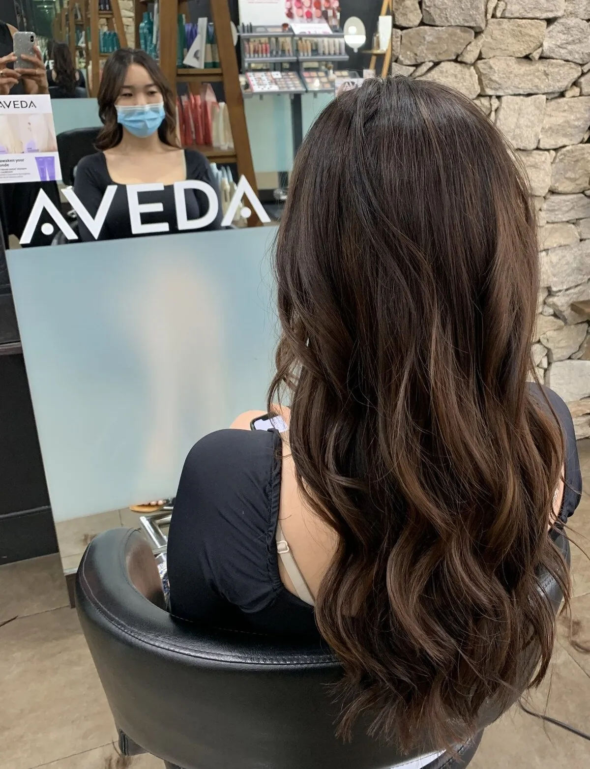 Long dark brunette layered cut at DC Hair Lounge Baulkham Hills