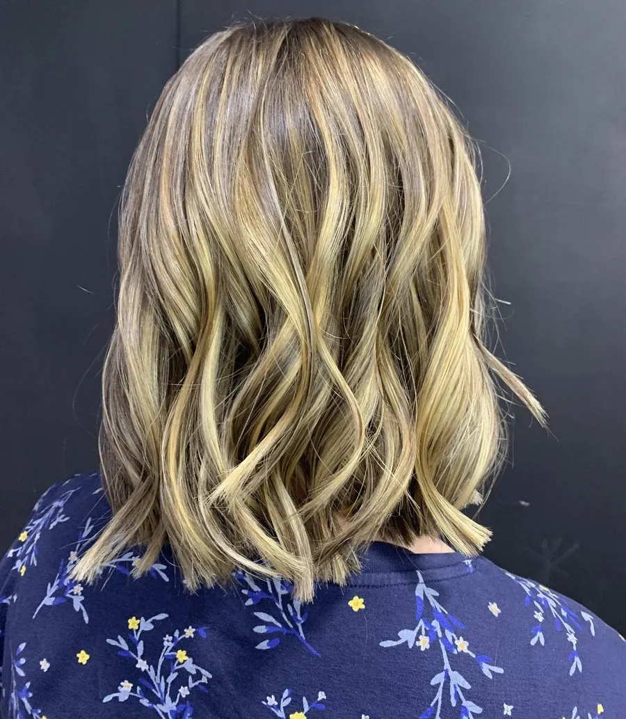 Honey golden blonde balayage lob at DC Hair Lounge