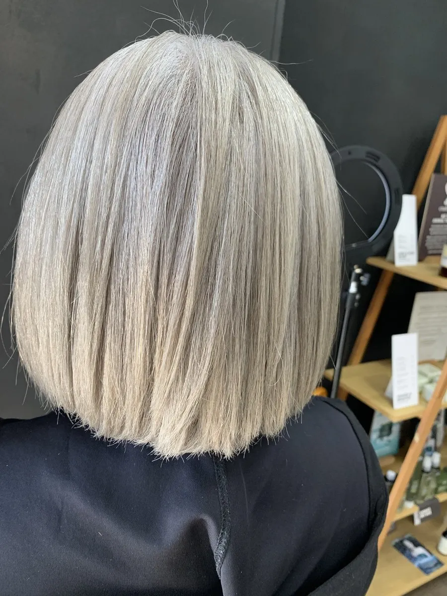 Ice platinum blonde blunt bob at DC Hair Lounge
