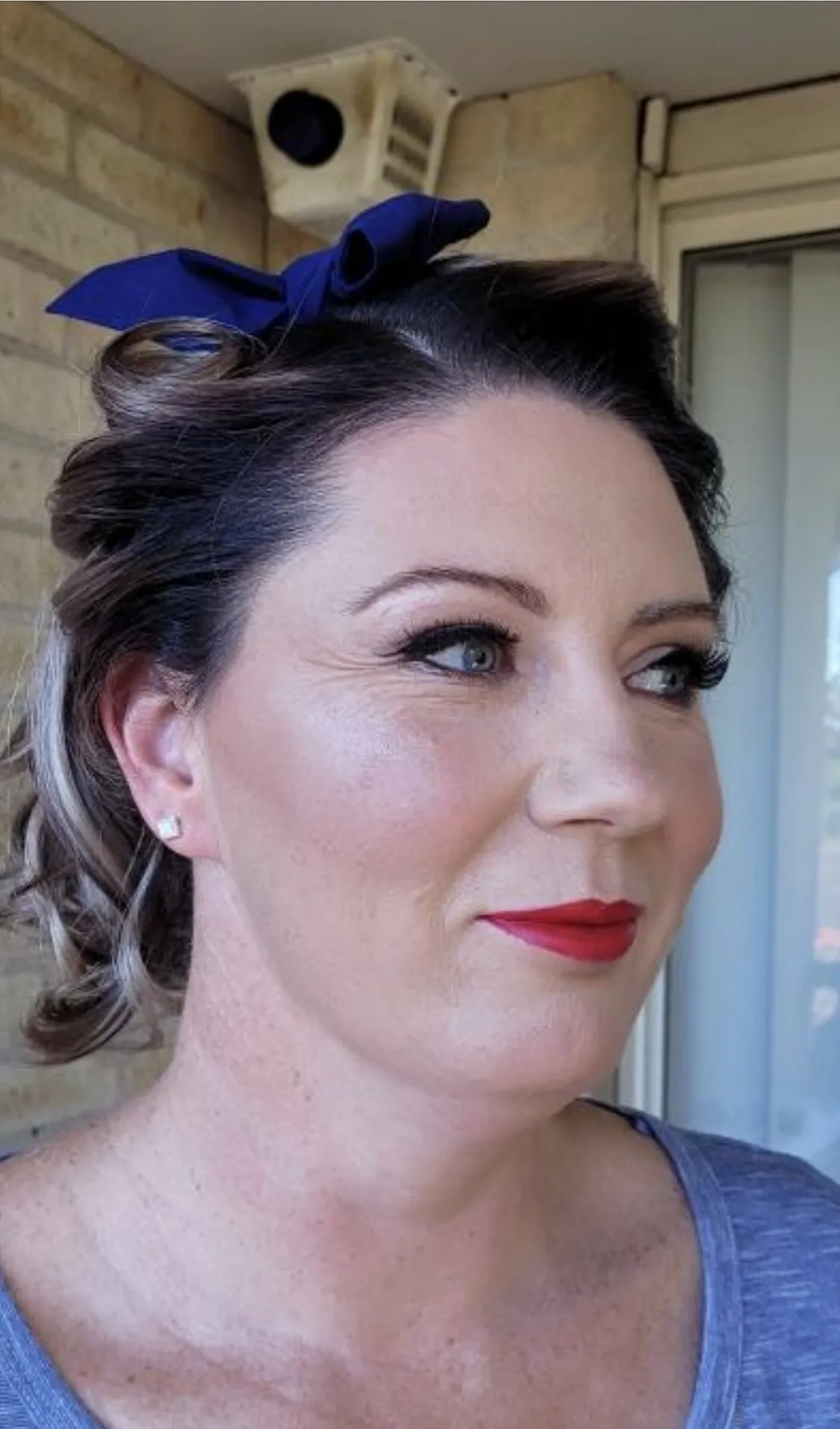 Retro updo with blue bow at DC Hair Lounge Baulkham Hills