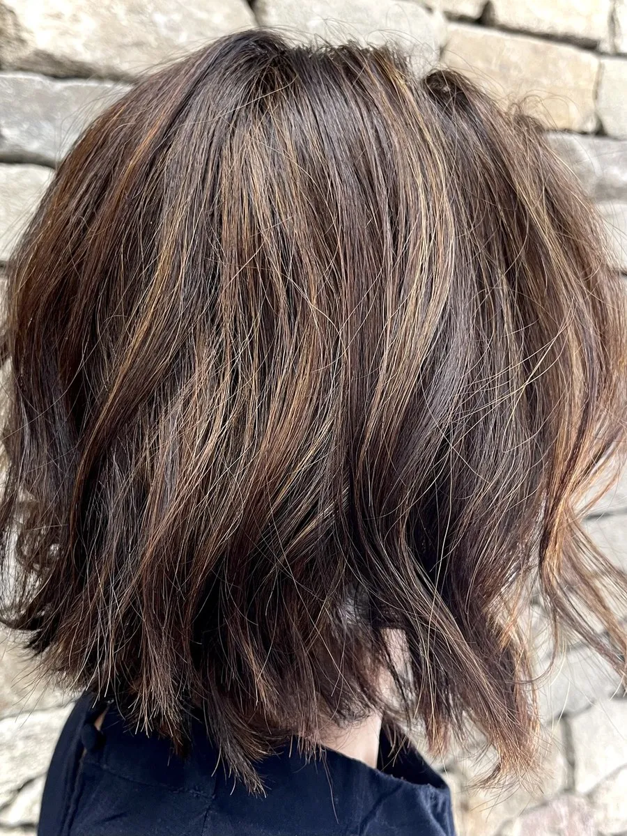 Textured brunette choppy lob at DC Hair Lounge